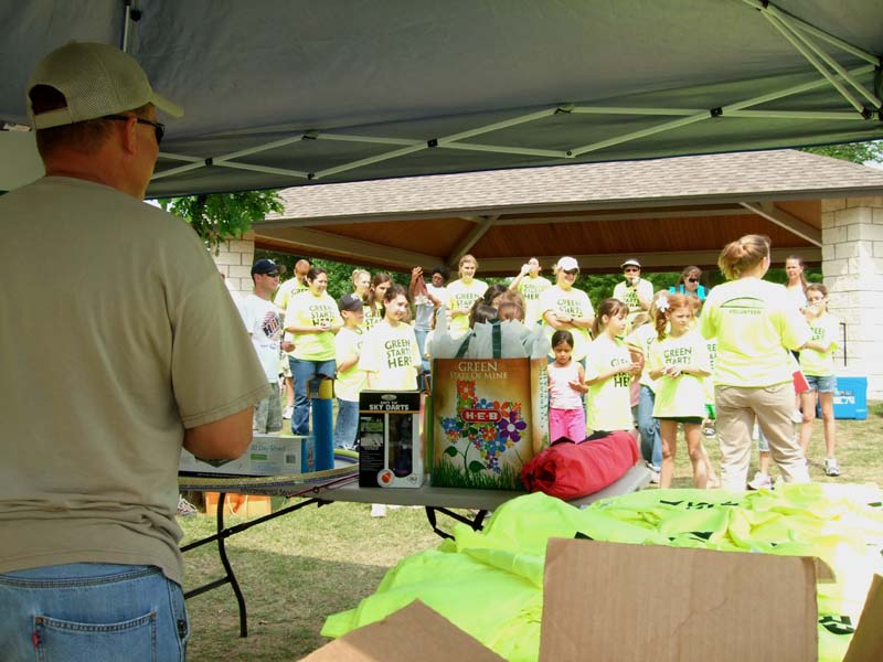 photo of kids and adults participating in clean up